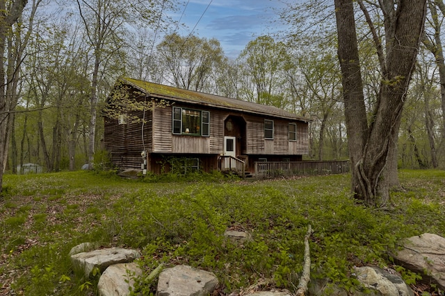 split foyer home with a wooden deck