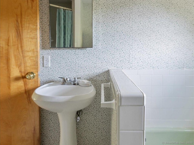 23 Pine Woods Rd, North Stonington, CT 06359 - bathroom featuring a shower with shower curtain, a bath, and wallpapered walls