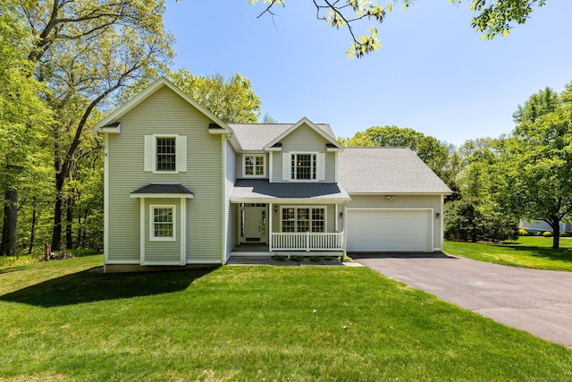 155 Camp Meeting Rd, Bolton, CT 06043 - traditional home featuring covered porch, driveway, a garage, and a front lawn