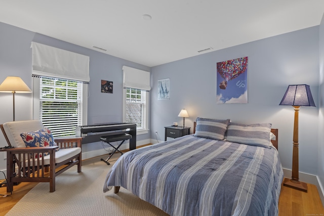 250 Joshua Point Rd, Guilford, CT 06437 - bedroom with baseboards and light wood-style flooring