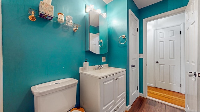 86 Butler Ave, Southington, CT 06489 - bathroom featuring vanity, wood finished floors, and toilet