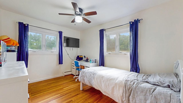 86 Butler Ave, Southington, CT 06489 - bedroom with light wood finished floors, baseboards, ceiling fan, and a baseboard radiator