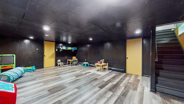 86 Butler Ave, Southington, CT 06489 - finished below grade area with stairway, wood finished floors, a paneled ceiling, and recessed lighting