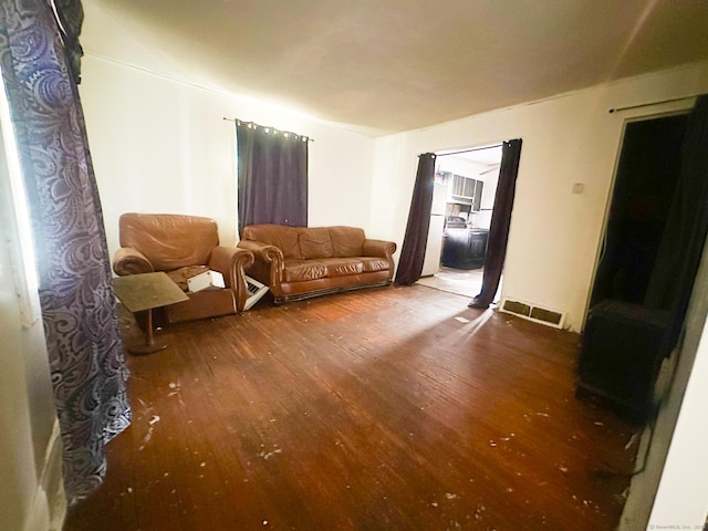 living area with wood-type flooring