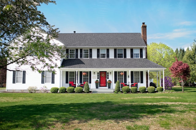 16 Fairgrounds Rd, Woodbury, CT 06798 - view of front of property with covered porch, roof with shingles, a front lawn, and a chimney