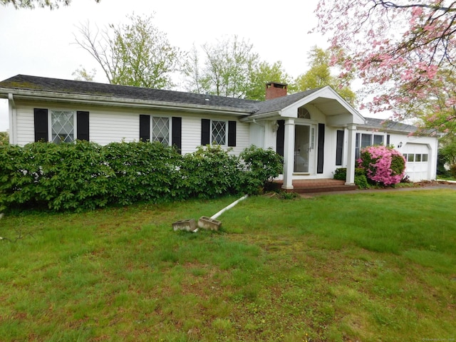42 Riverside Dr, Branford, CT 06405 - ranch-style house with a chimney, a front yard, and an attached garage