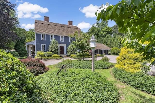 173 Highwoods Dr, Guilford, CT 06437 - view of front of house with a chimney