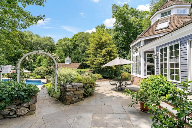 173 Highwoods Dr, Guilford, CT 06437 - view of patio / terrace featuring an outdoor pool and outdoor dining space