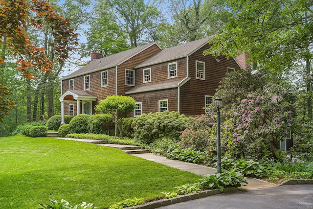 41 Little Brook Rd, Wilton, CT 06897 - shingle-style home featuring a chimney, a shingled roof, and a front yard
