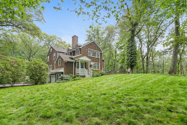 41 Little Brook Rd, Wilton, CT 06897 - view of side of home featuring a chimney and a yard