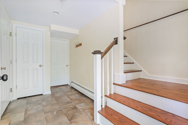 41 Little Brook Rd, Wilton, CT 06897 - entryway featuring baseboard heating, stairway, and baseboards