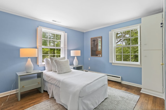41 Little Brook Rd, Wilton, CT 06897 - bedroom featuring baseboard heating, baseboards, ornamental molding, and wood finished floors