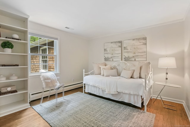 41 Little Brook Rd, Wilton, CT 06897 - bedroom featuring a baseboard radiator, ornamental molding, baseboards, and wood finished floors