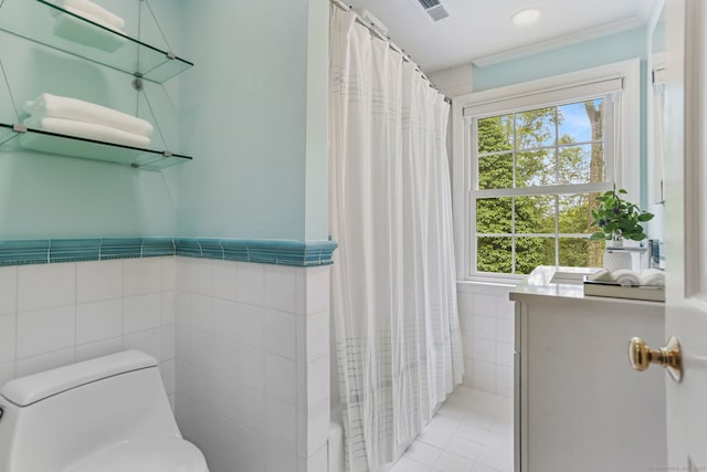 41 Little Brook Rd, Wilton, CT 06897 - full bathroom with tile walls, toilet, tile patterned floors, plenty of natural light, and shower / bath combo