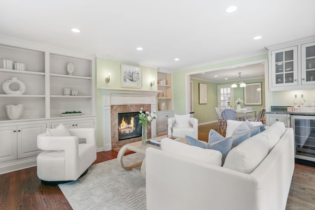 41 Little Brook Rd, Wilton, CT 06897 - living area with beverage cooler, ornamental molding, bar area, dark wood finished floors, and baseboards