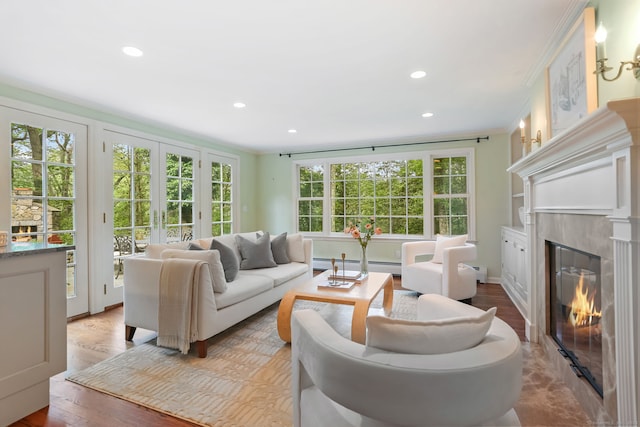 41 Little Brook Rd, Wilton, CT 06897 - living room featuring a fireplace, recessed lighting, crown molding, baseboard heating, and wood finished floors