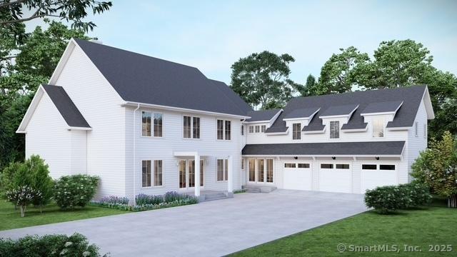 21 Warnock Dr, Westport, CT 06880 - view of front of home with driveway and a front yard