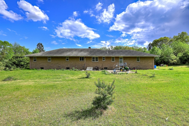 23 Pinesbridge Rd, Oxford, CT 06478 - back of house featuring a yard, crawl space, brick siding, and a patio