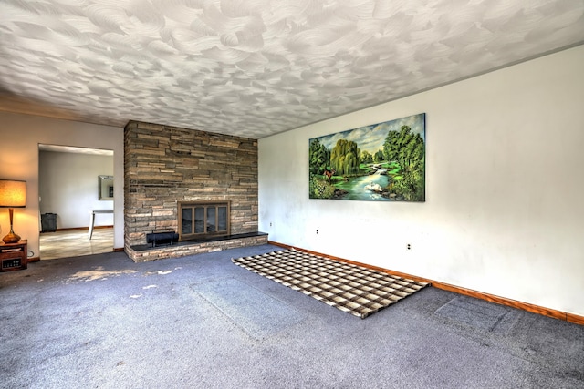 23 Pinesbridge Rd, Oxford, CT 06478 - unfurnished living room featuring baseboards, a fireplace, carpet flooring, and a textured ceiling