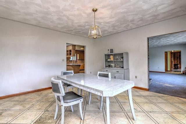 23 Pinesbridge Rd, Oxford, CT 06478 - dining room with a chandelier, baseboards, and a textured ceiling