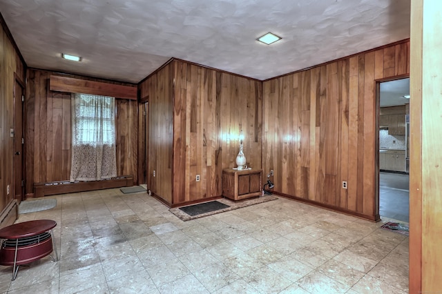 23 Pinesbridge Rd, Oxford, CT 06478 - spare room with wood walls, tile patterned floors, and baseboards