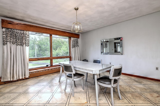 23 Pinesbridge Rd, Oxford, CT 06478 - dining area featuring a chandelier and baseboards