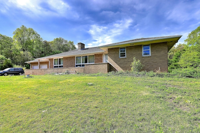 23 Pinesbridge Rd, Oxford, CT 06478 - single story home with brick siding, a front lawn, a chimney, and a garage