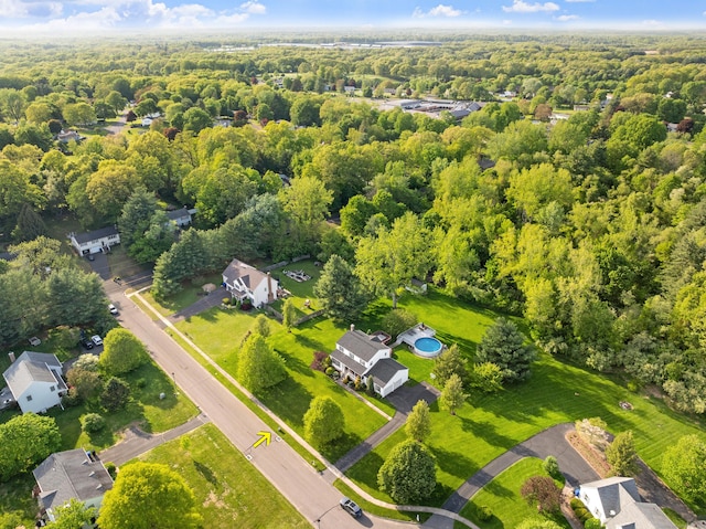 drone / aerial view of a heavily wooded area