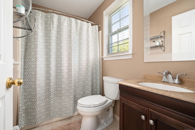 full bathroom with toilet, vanity, tile patterned floors, and a shower with shower curtain