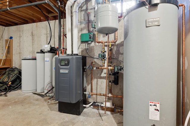 utility room with water heater