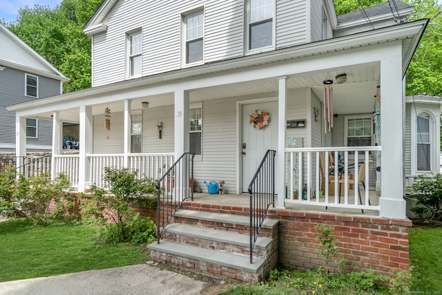 35 S St, Bethel, CT 06801 - view of front of home featuring a porch and a front yard