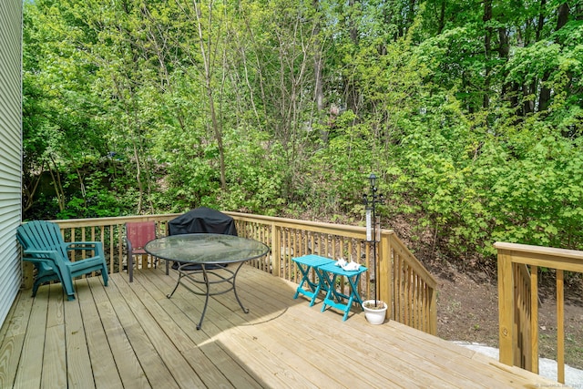 35 S St, Bethel, CT 06801 - deck featuring outdoor dining space, a forest view, and area for grilling
