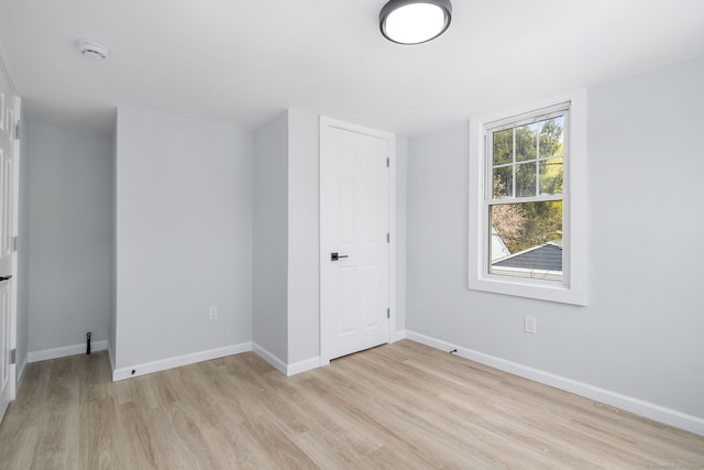 35 S St, Bethel, CT 06801 - spare room featuring light wood-type flooring and baseboards