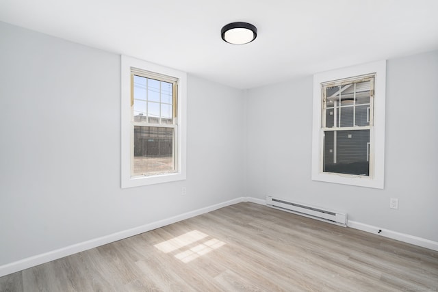 35 S St, Bethel, CT 06801 - empty room featuring a baseboard radiator, wood finished floors, and baseboards