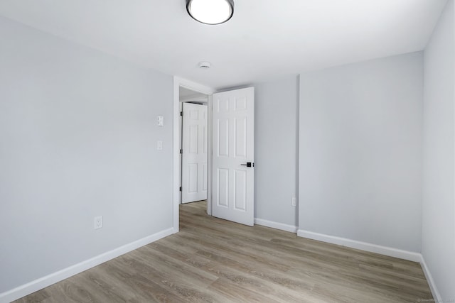 35 S St, Bethel, CT 06801 - unfurnished room with baseboards, light wood-type flooring, and a smoke detector
