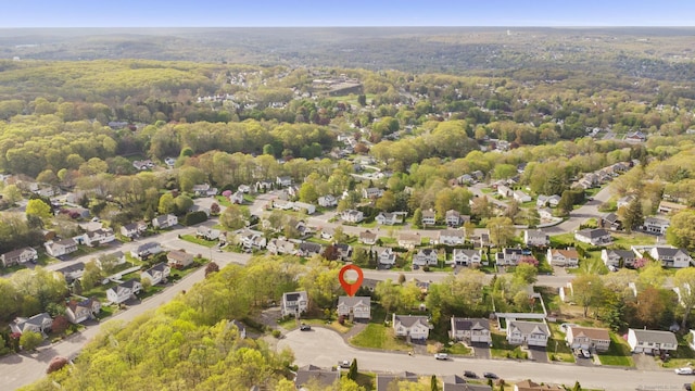 bird's eye view featuring a residential view and a view of trees