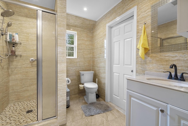 13 Woodcrest Dr, Waterbury, CT 06708 - full bath with vanity, toilet, a stall shower, and tile walls