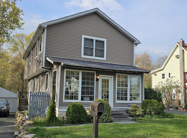 view of front facade featuring a front yard