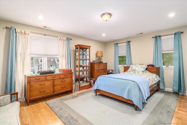 37A/K/A27 Oregon Ave, East Haven, CT 06512 - bedroom with multiple windows, light wood-style floors, and recessed lighting
