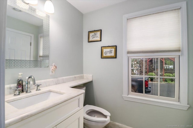 37A/K/A27 Oregon Ave, East Haven, CT 06512 - half bath with vanity, toilet, and baseboards