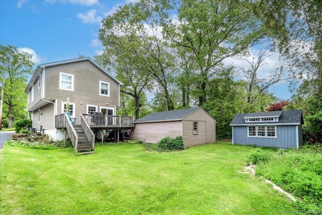 37A/K/A27 Oregon Ave, East Haven, CT 06512 - rear view of property featuring a lawn, a wooden deck, an outdoor structure, and stairway