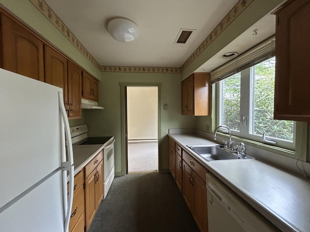8 Pilgrim Hbr Unit A, Wallingford, CT 06492 - kitchen with white appliances, a sink, under cabinet range hood, light countertops, and carpet floors