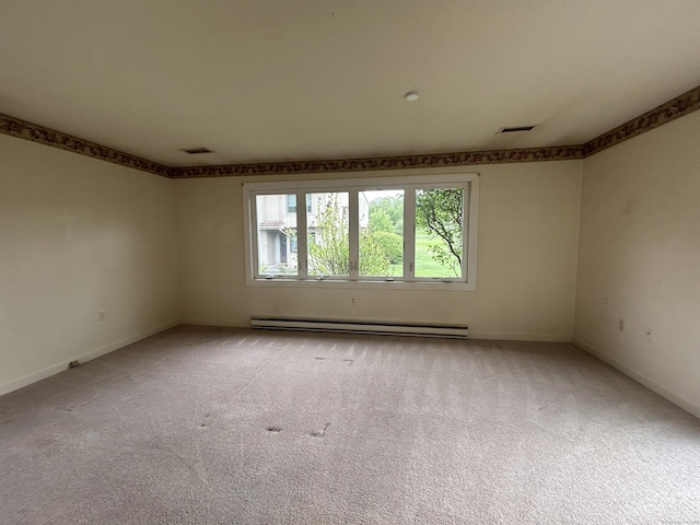 8 Pilgrim Hbr Unit A, Wallingford, CT 06492 - unfurnished room featuring a baseboard radiator, light carpet, and baseboards