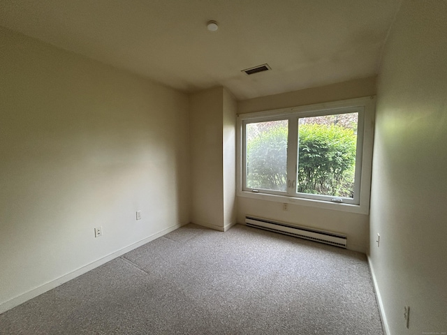 8 Pilgrim Hbr Unit A, Wallingford, CT 06492 - carpeted empty room with a baseboard heating unit and baseboards
