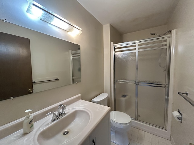 8 Pilgrim Hbr Unit A, Wallingford, CT 06492 - bathroom with a shower stall, toilet, tile patterned floors, and vanity