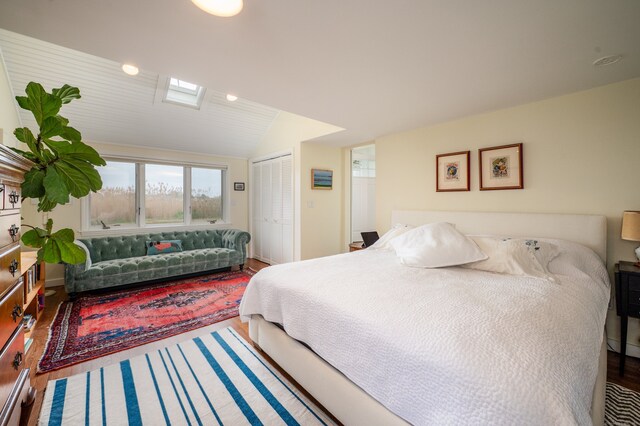 3 Clark Ave, Old Saybrook, CT 06475 - bedroom featuring wood finished floors, vaulted ceiling, and a closet