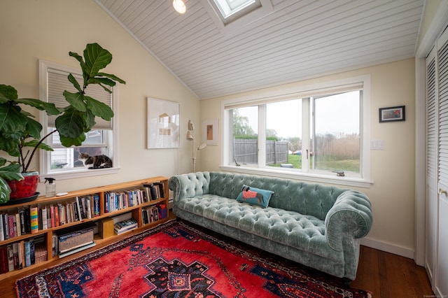 3 Clark Ave, Old Saybrook, CT 06475 - sitting room with vaulted ceiling, wood finished floors, a skylight, baseboards, and wooden ceiling