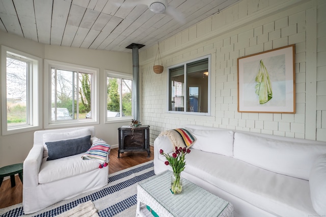3 Clark Ave, Old Saybrook, CT 06475 - sunroom / solarium featuring a wood stove and healthy amount of natural light
