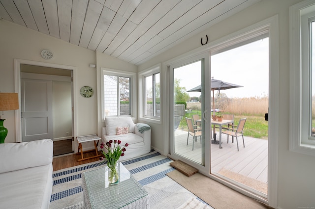 3 Clark Ave, Old Saybrook, CT 06475 - sunroom / solarium featuring wood finished floors, vaulted ceiling, wooden ceiling, baseboards, and a deck