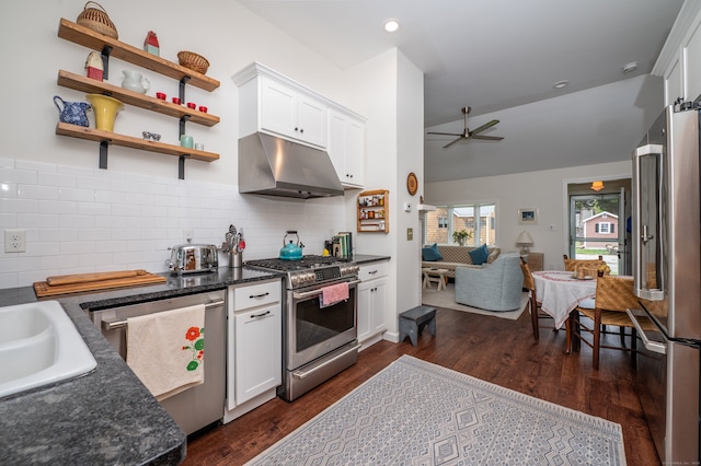3 Clark Ave, Old Saybrook, CT 06475 - kitchen with stainless steel appliances, under cabinet range hood, a ceiling fan, white cabinets, and decorative backsplash